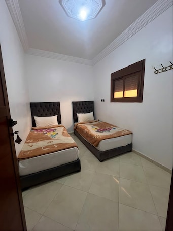 Chambre Double ou avec lits jumeaux | Wi-Fi gratuit. Hôtel ELGOUIRA