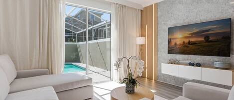 Huvila (4 Bedrooms) | Oleskelualue | 50–tuumainen televisio, jossa kaapelikanavat
