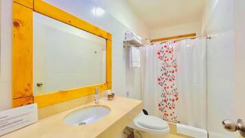 Superior Room, 1 Queen Bed | Bathroom | Shower, free toiletries, towels, soap
