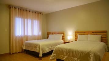 Premium bedding, down duvets, desk, laptop workspace