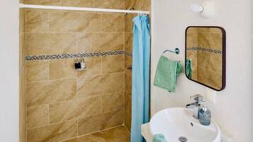 Jetted bath, towels, soap, toilet paper