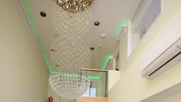 Deluxe Double Room, Balcony, City View | Living area