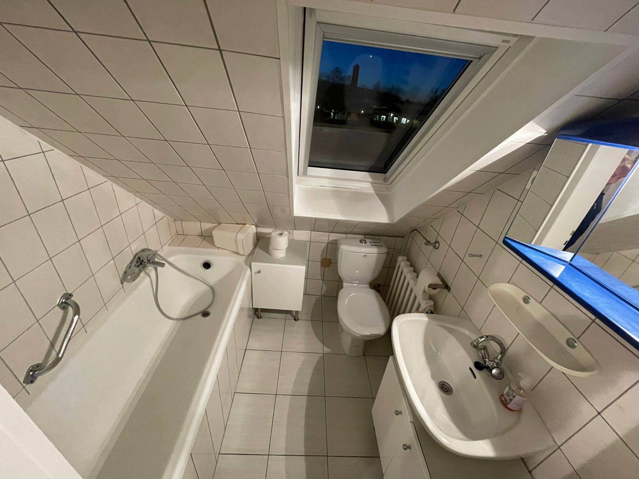 Hair dryer, towels, soap, toilet paper