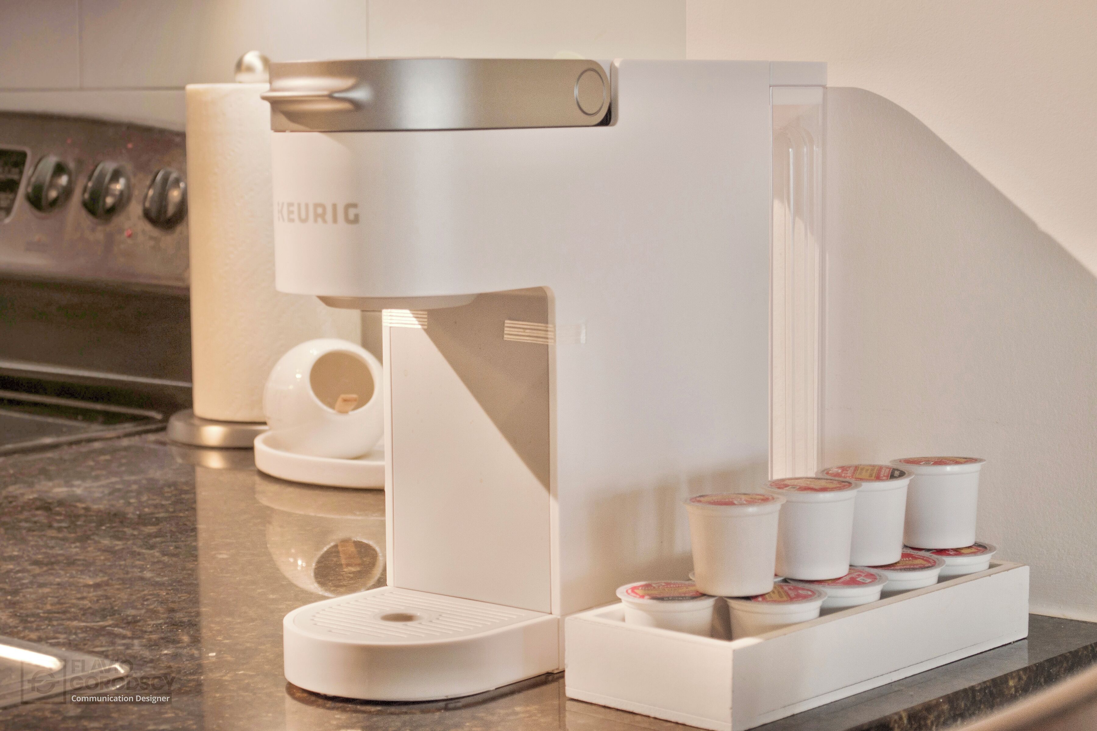 A coffee machine with a coffee pod holder.