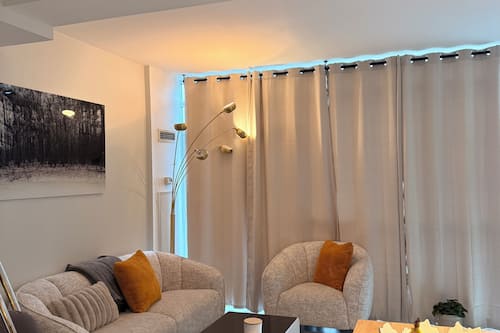 Chambre Luxe, vue ville | Coin séjour