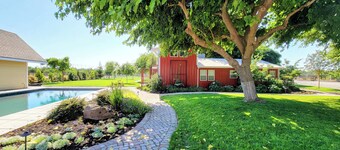 Cozy 2-bedroom farm house in delightful Hughson.Fenced & gated.