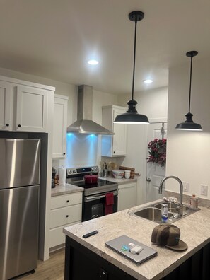 Private kitchen - Unit 70 Brand new 3-bedroom pre manufactured home with AC in Dry Creek Basin  (Redvale)