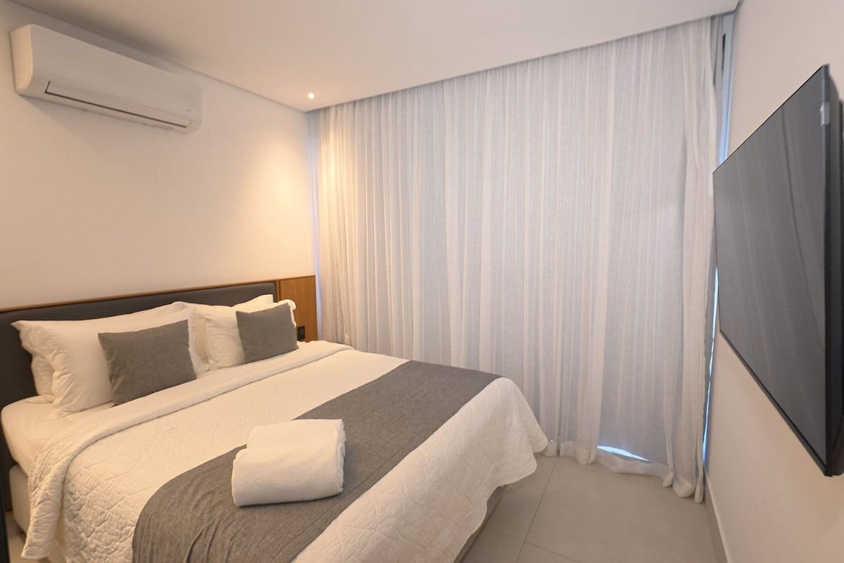 Premium bedding, minibar, laptop workspace, free cribs/infant beds