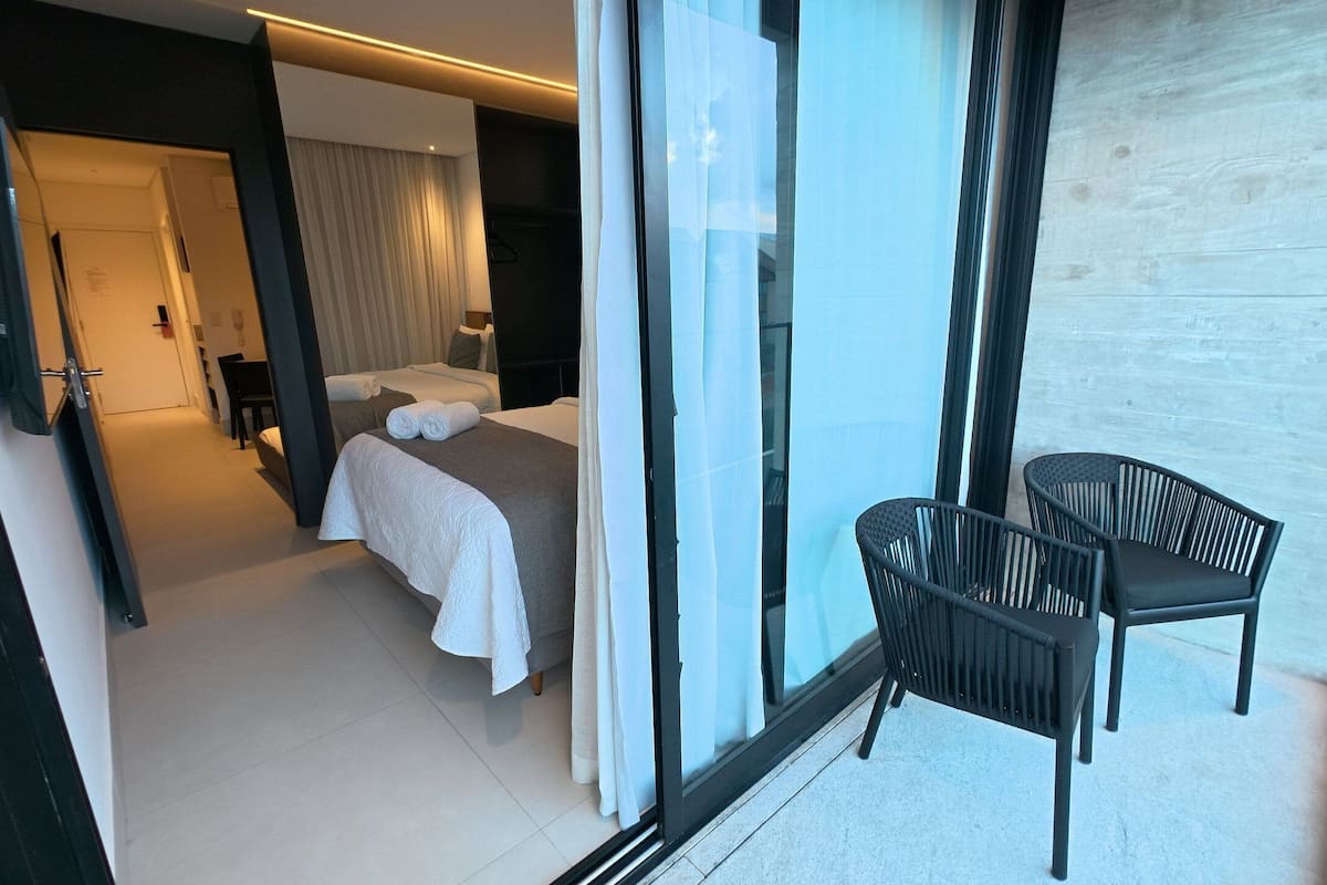 Premium bedding, minibar, laptop workspace, free cribs/infant beds
