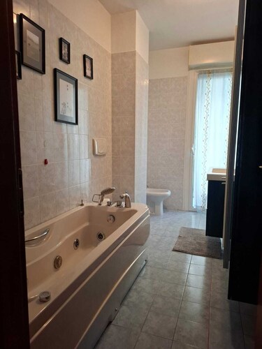 Cozy three-bedroom apartment in Santa Giulia, well-serviced neighborhood