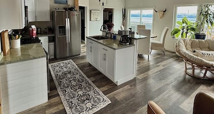 Quaint 2-bedroom bungalow perched above Homer and Kachemak Bay.