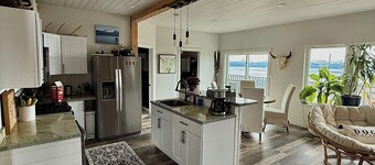 Quaint 2-bedroom bungalow perched above Homer and Kachemak Bay.