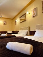 Family Quadruple Room, Courtyard View | Spa