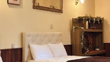 Familie vierpersoonskamer, uitzicht op de binnenplaats