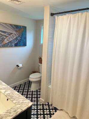 Hair dryer, towels, soap, toilet paper