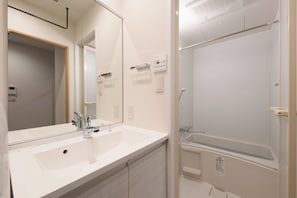 Comfort Apartment, 1 Bedroom | Bathroom | Separate bathtub and shower, eco-friendly toiletries, hair dryer - TD STAY TOKYO (Tokyo)