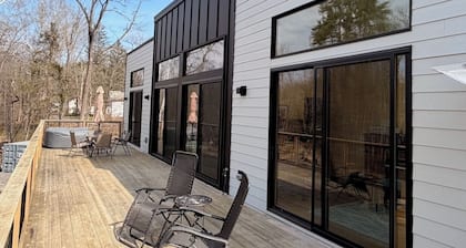 Brand new riverfront home with private beach, modern, serene, central HV spot.