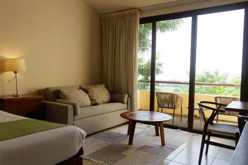 Suite Superior, balkon | Area keluarga | Smart TV