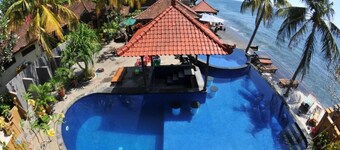 Paradise Palm Beach Bungalows and Dive Center