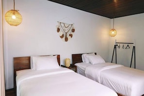 Chambre Deluxe double ou avec lits jumeaux | AccĂšs au Wi-Fi (inclus)