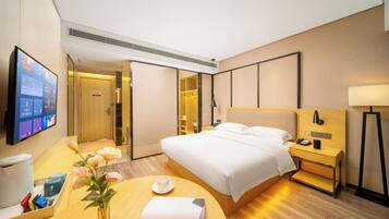 Premium bedding, down duvets, desk, laptop workspace