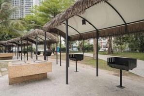 A covered outdoor area with seating and a water feature. - TROY HOUSE - MASTERI WEST HEIGHTS (Hanoi)