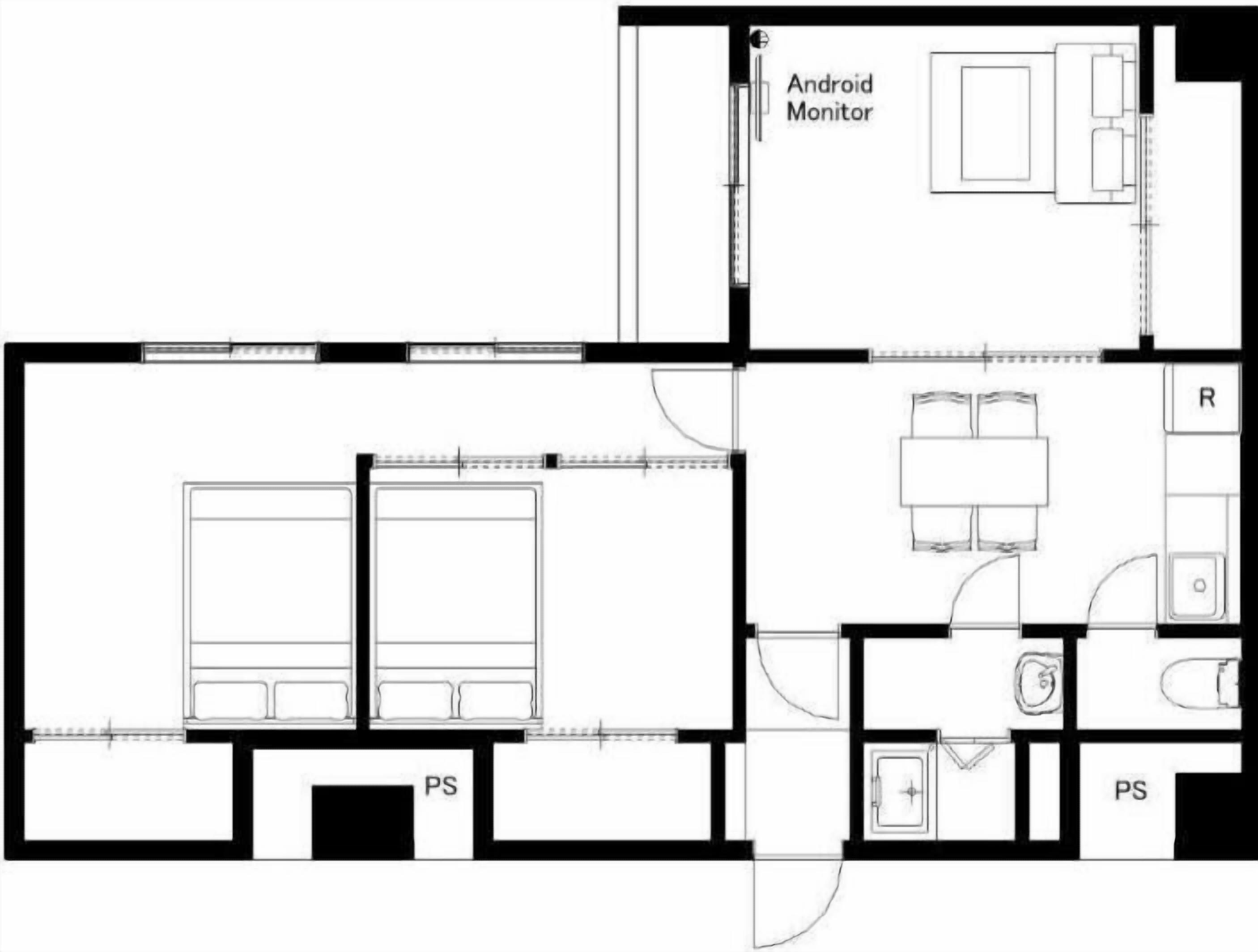 Plano de planta que muestra dos dormitorios, un baño, una cocina y una sala de estar.