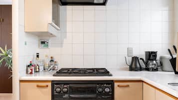 Fridge, microwave, stovetop, coffee/tea maker