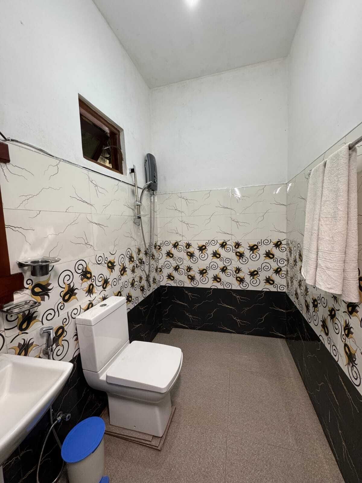 Family Triple Room, Balcony, Mountain View | Bathroom | Shower, hair dryer, towels, soap