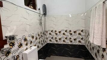 Family Triple Room, Balcony, Mountain View | Bathroom | Shower, hair dryer, towels, soap