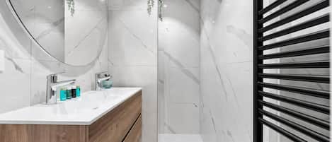 Shower, hair dryer, towels, soap