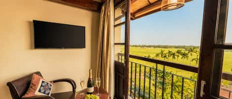 Suite Signature, 1 cama de matrimonio grande, balcón, vistas al jardín | Vistas desde la habitación