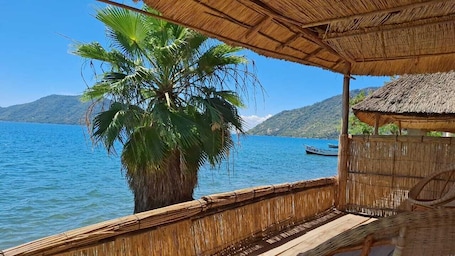 Standard Cabin, Balcony, Lake View | Property grounds. Anake Lodge