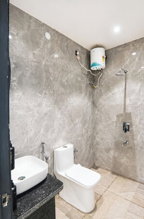 Shower, rainfall showerhead, slippers, towels