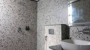 Shower, rainfall showerhead, slippers, towels