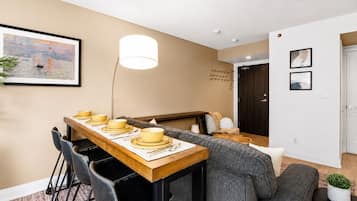 Economy Studio Suite, 1 Queen Bed with Sofa bed, Non Smoking, Private Bathroom | Living area | 50-inch flat-screen TV with digital channels