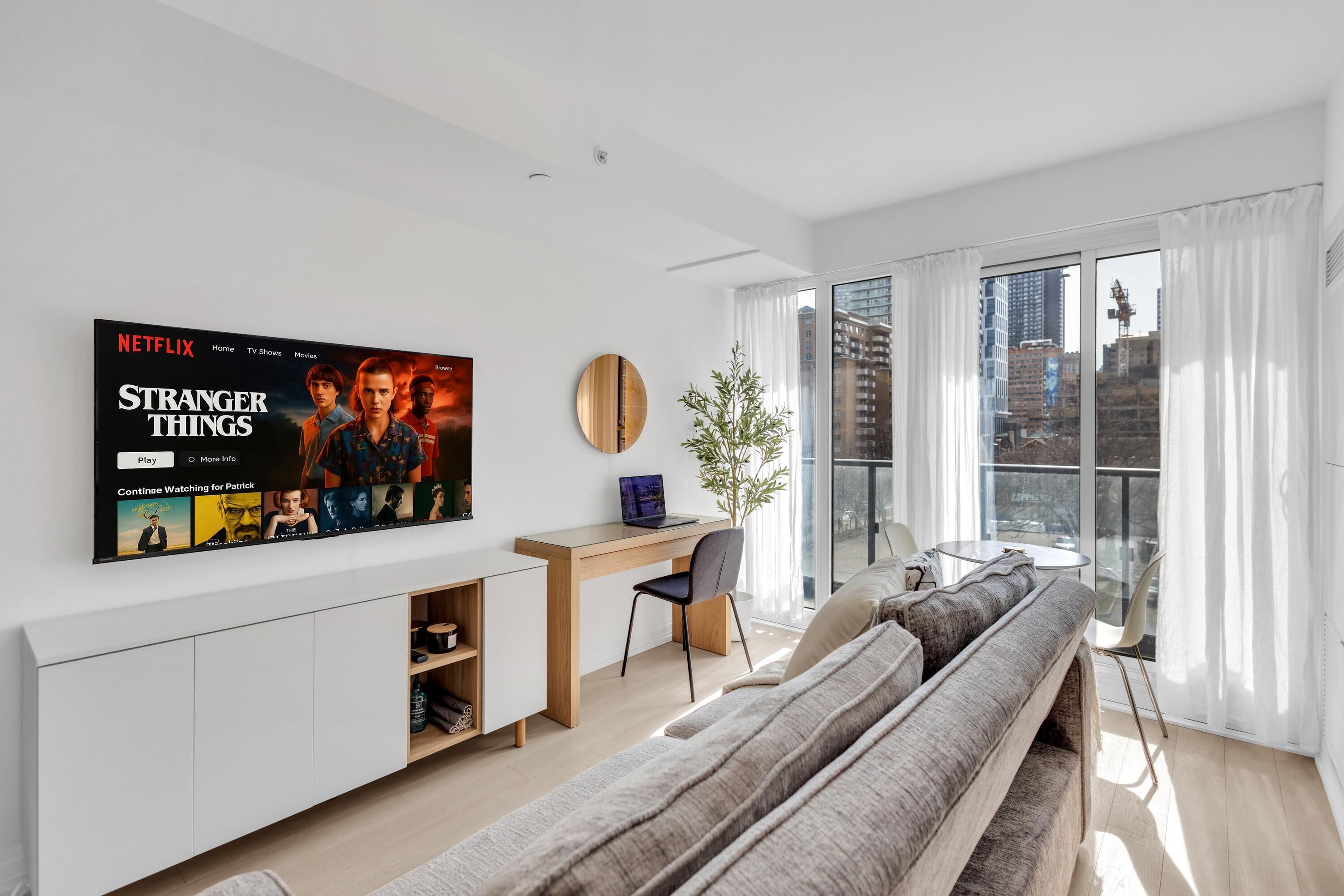 Deluxe Suite, 1 Bedroom, Non Smoking, City View | Living area | 50-inch flat-screen TV with digital channels