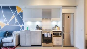 Executive Suite, 2 Bedrooms, Non Smoking, City View | Private kitchen | Fridge, microwave, oven, stovetop