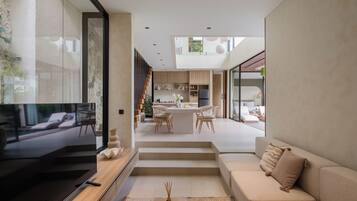 Villa Exécutive, 2 chambres, balcon, vue partielle sur la mer | Coin séjour