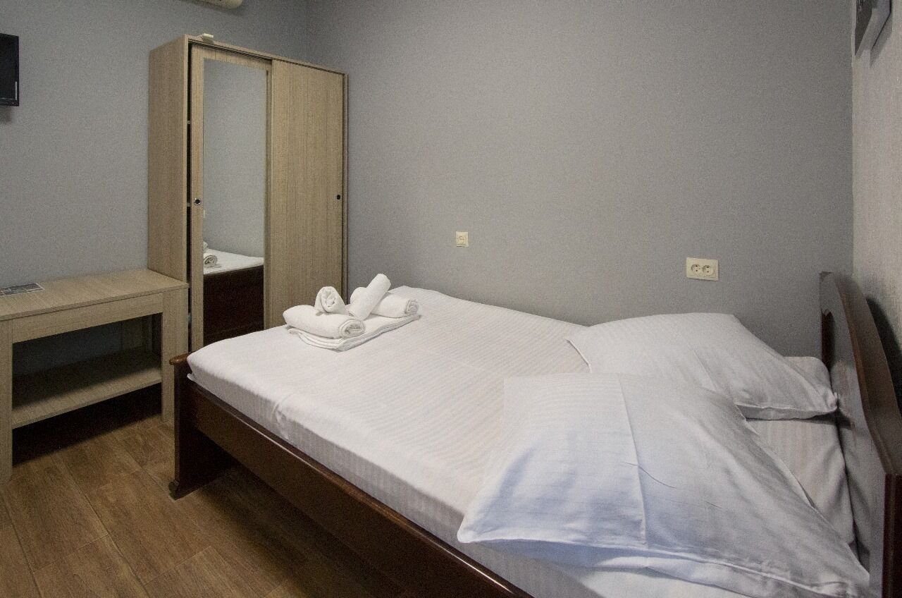 Comfort Quadruple Room, Balcony, City View