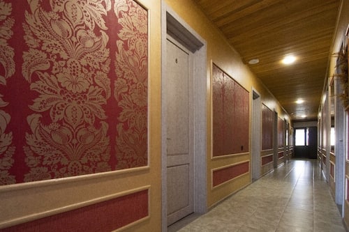 Comfort vierpersoonskamer, balkon, uitzicht op de stad | Interieur