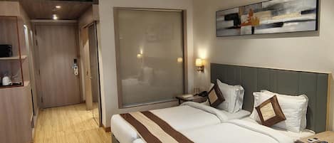 Deluxe Double or Twin Room | Premium bedding, minibar, in-room safe, desk