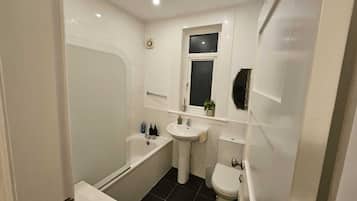 Hair dryer, towels, soap, toilet paper