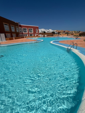 Pool. Holiday Home 'Salitre y Lava' with Shared Pool and Private Terrace