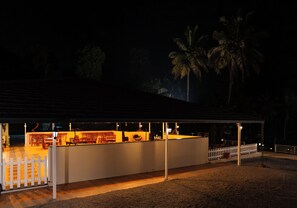 Outdoor dining - Alaya Stay Twisted Tree with Pool (Virajpet)