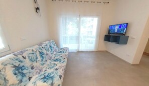 Appartement, 3 slaapkamers, terras, uitzicht op tuin | Kamervoorziening