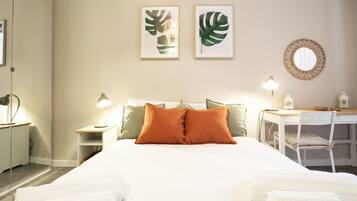 1 habitación, tabla de planchar con plancha, wifi gratis y ropa de cama