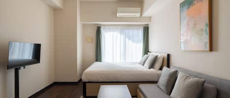 Chambre, non-fumeur, vue sur la ville (c03) | AccĂšs au Wi-Fi (inclus), literie fournie