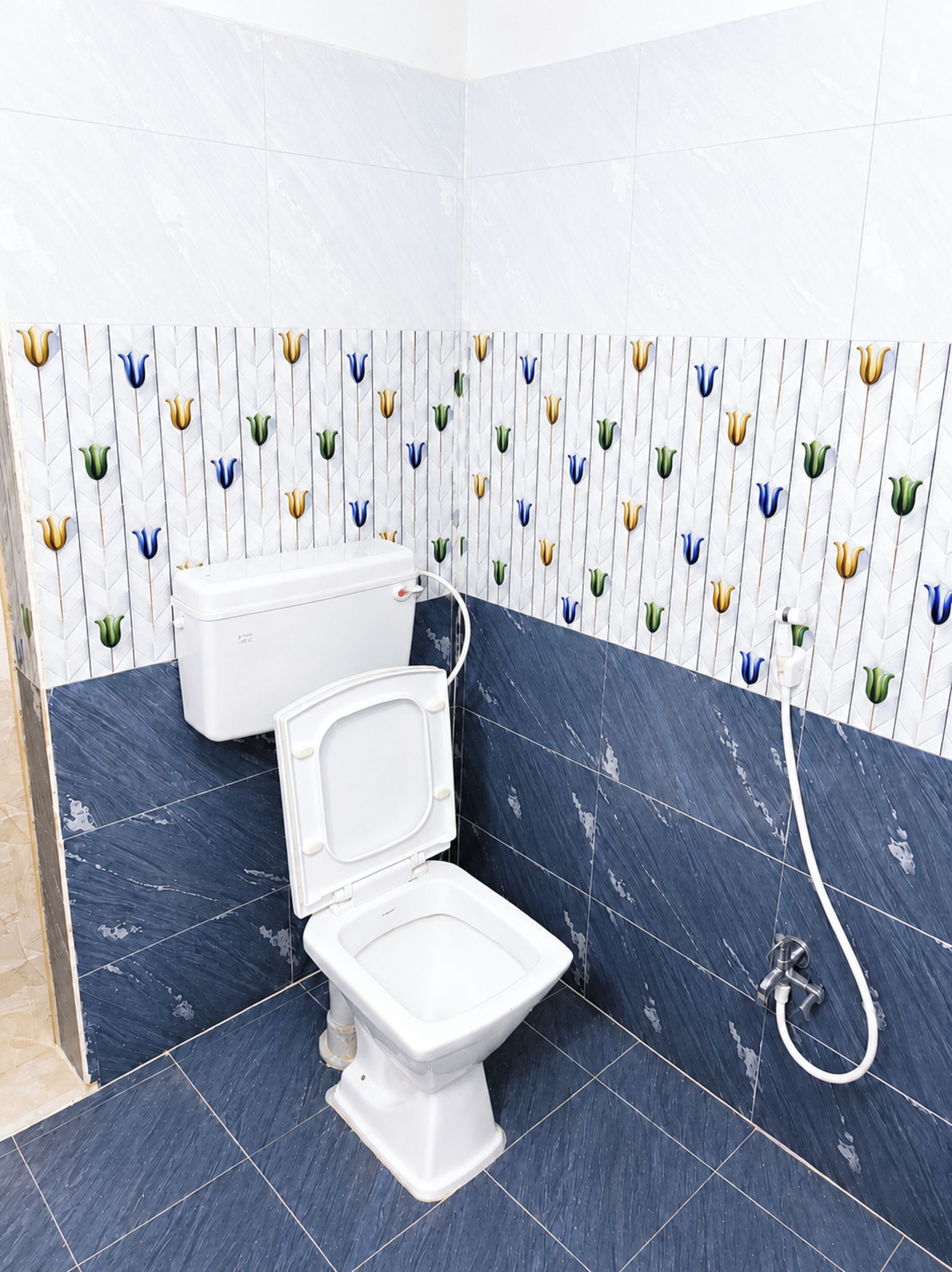 Shower, rainfall showerhead, slippers, towels