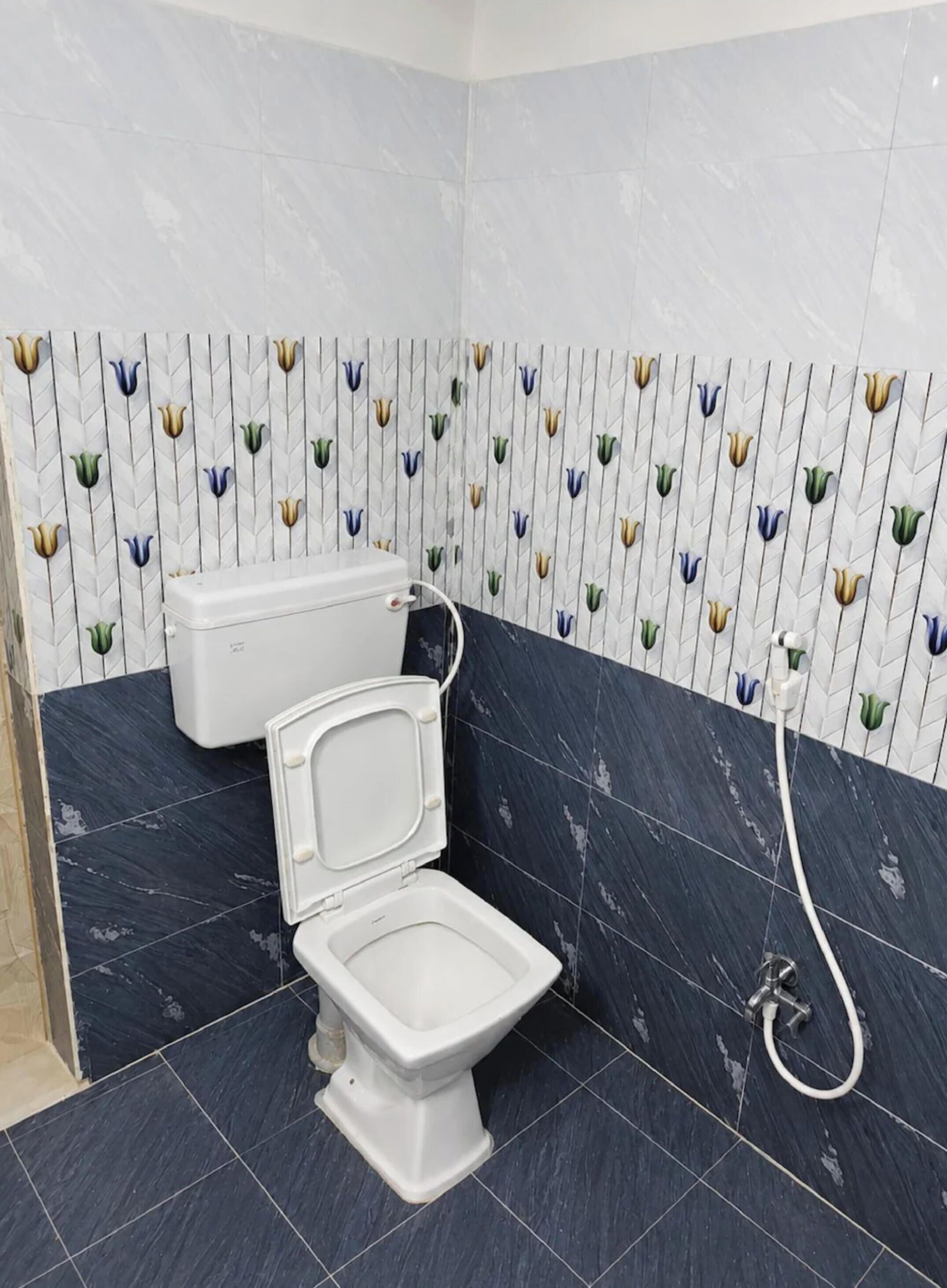 Shower, rainfall showerhead, slippers, towels